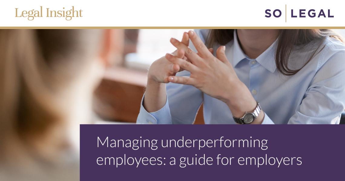 Employer discussing performance concerns with an employee during a workplace meeting.