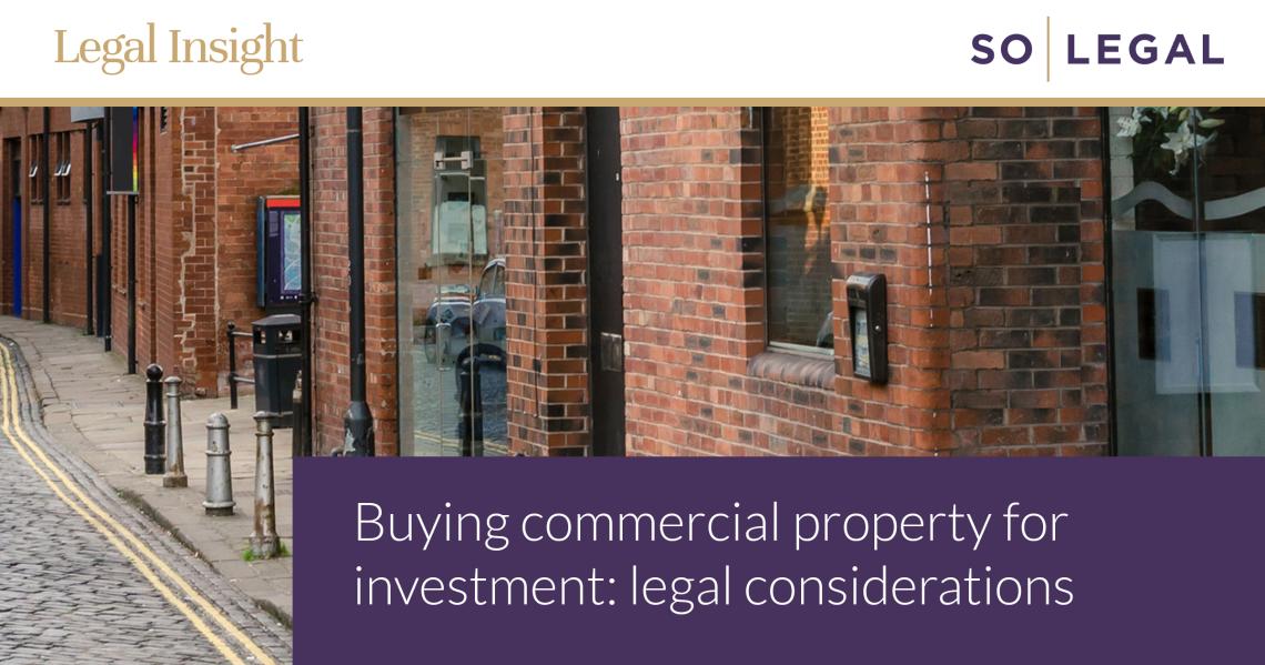 Cobbled street lined with renovated brick commercial and mixed-use investment properties.